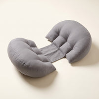 Grey Bumpwell pregnancy wedge pillow with two half-moon cushions joined by a fabric band