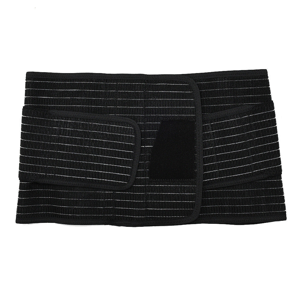 Black postpartum belly wrap laid flat, showing the hook-and-loop closure