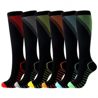 Six pairs of black knee-high compression socks, each with a different accent color