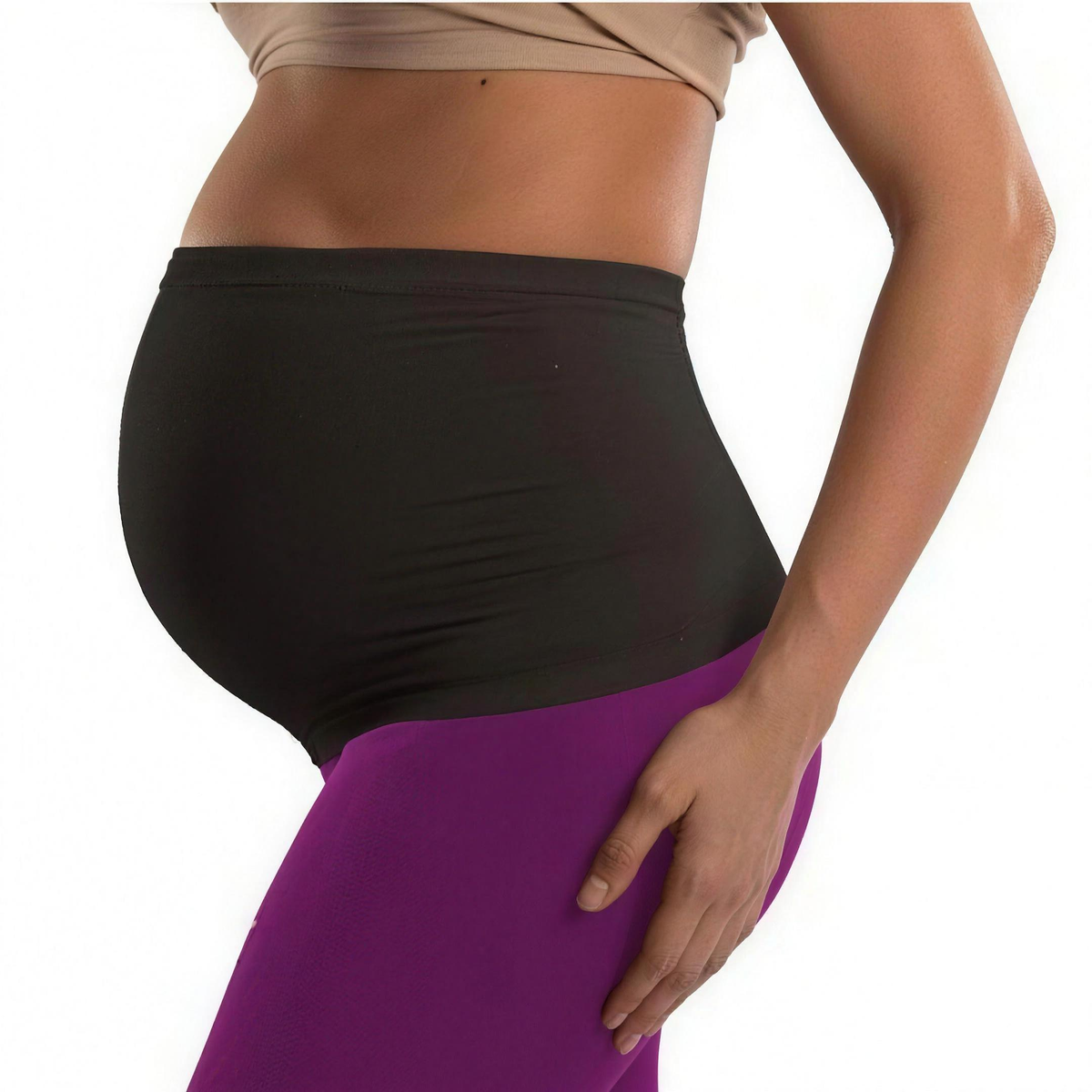 Black seamless belly band worn with leggings, side view