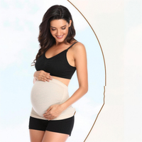 Pregnant woman wearing the nude seamless belly band, front view