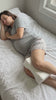 Bumpwell side sleeper knee pillow in use